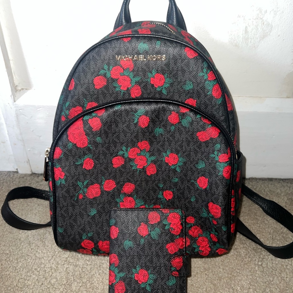 Michael Kors Black Backpack with Red Floral Design